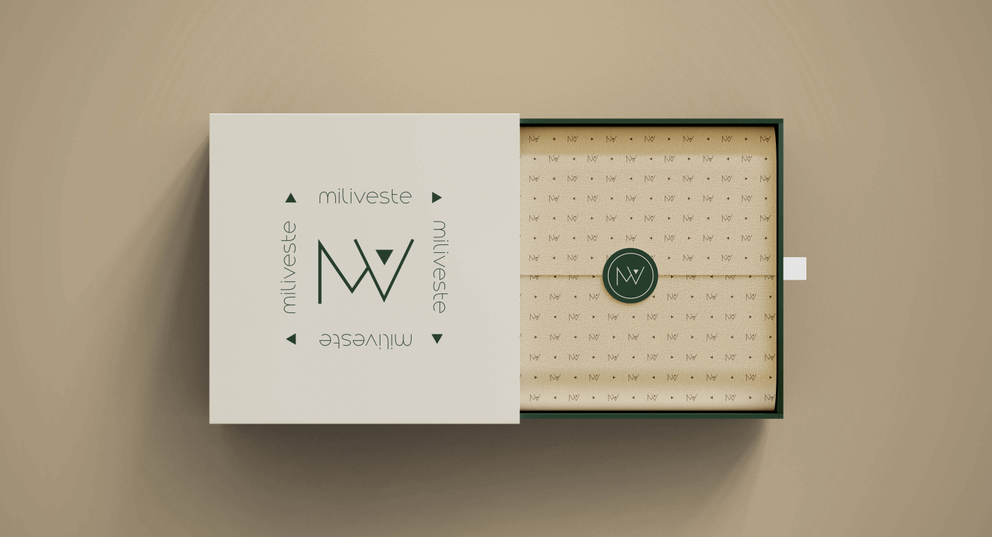 Cliente: Miliveste Serviço: Identidade Visual e papelaria/digital Ano: 2021 A Miliveste é uma marca atemporal de roupas femininas, que veste todo tipo de mulher, com praticidade, conforto e elegância, a deixando pronta para qualquer ocasião. O símbolo é um monograma com as letras M e V, e foi pensado com o objetivo de deixar a identidade visual mais forte e marcante e versátil em suas aplicações. O triângulo remete à seta (direções - lados) que representa a versatilidade da marca.